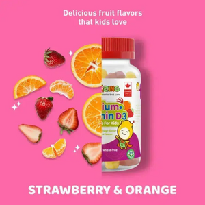 Vitamin supplement bottle with strawberry and orange flavors on a pink background